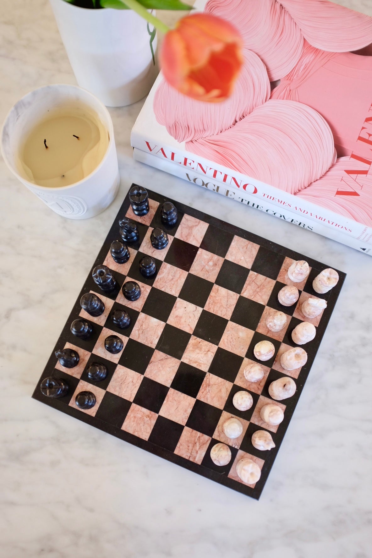 Pink and black marble chess board