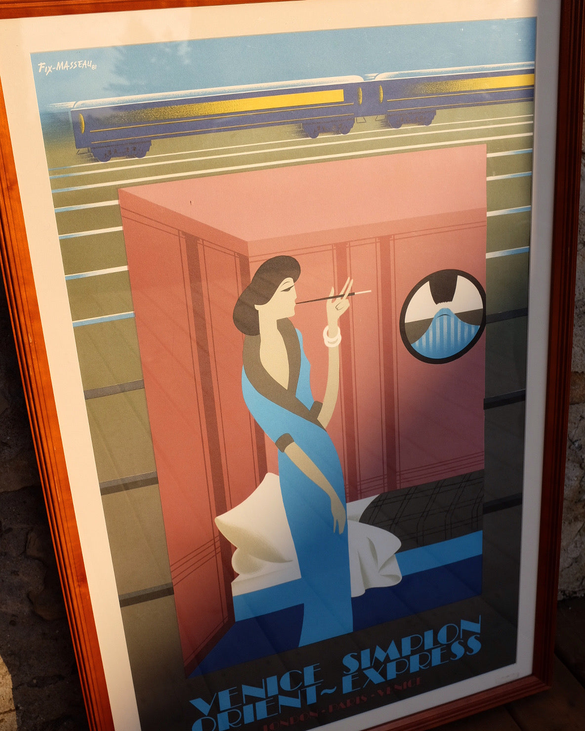Venice Simplon - Woman in Blue 1981 Framed French Travel Poster by Fix Masseau