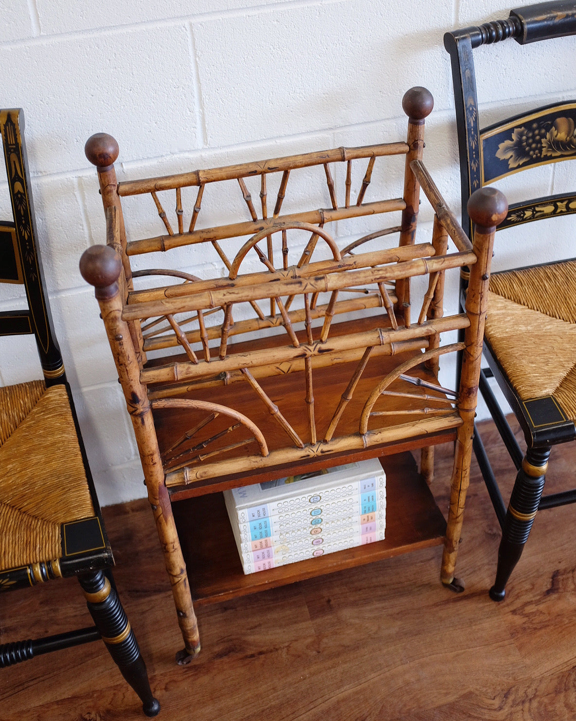 1930s Burnt Bamboo Magazine Rack on Casters