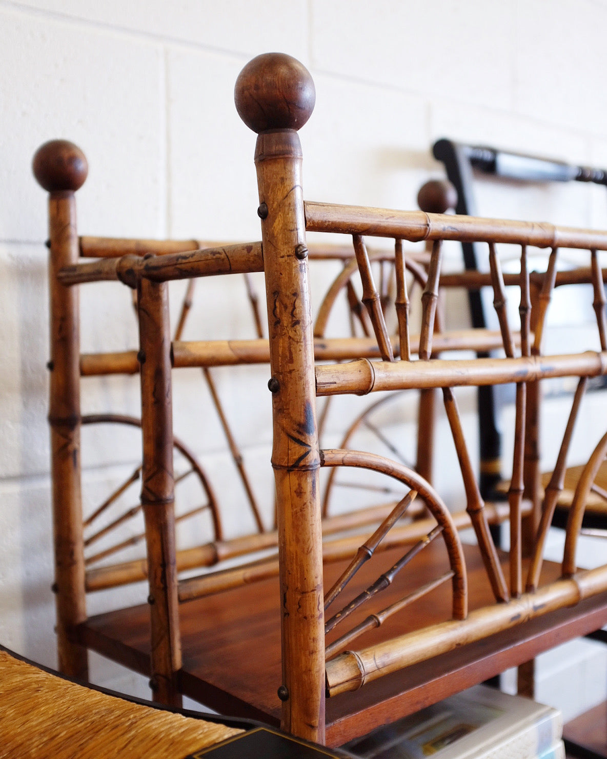1930s Burnt Bamboo Magazine Rack on Casters