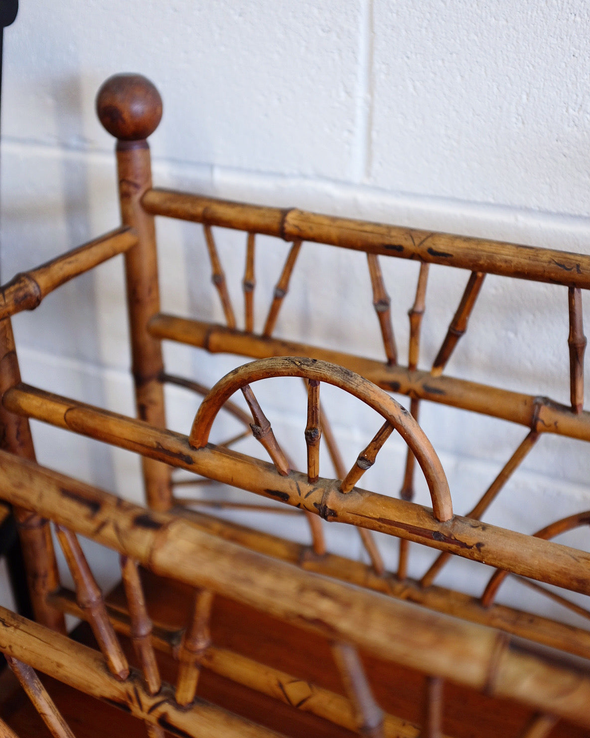 1930s Burnt Bamboo Magazine Rack on Casters