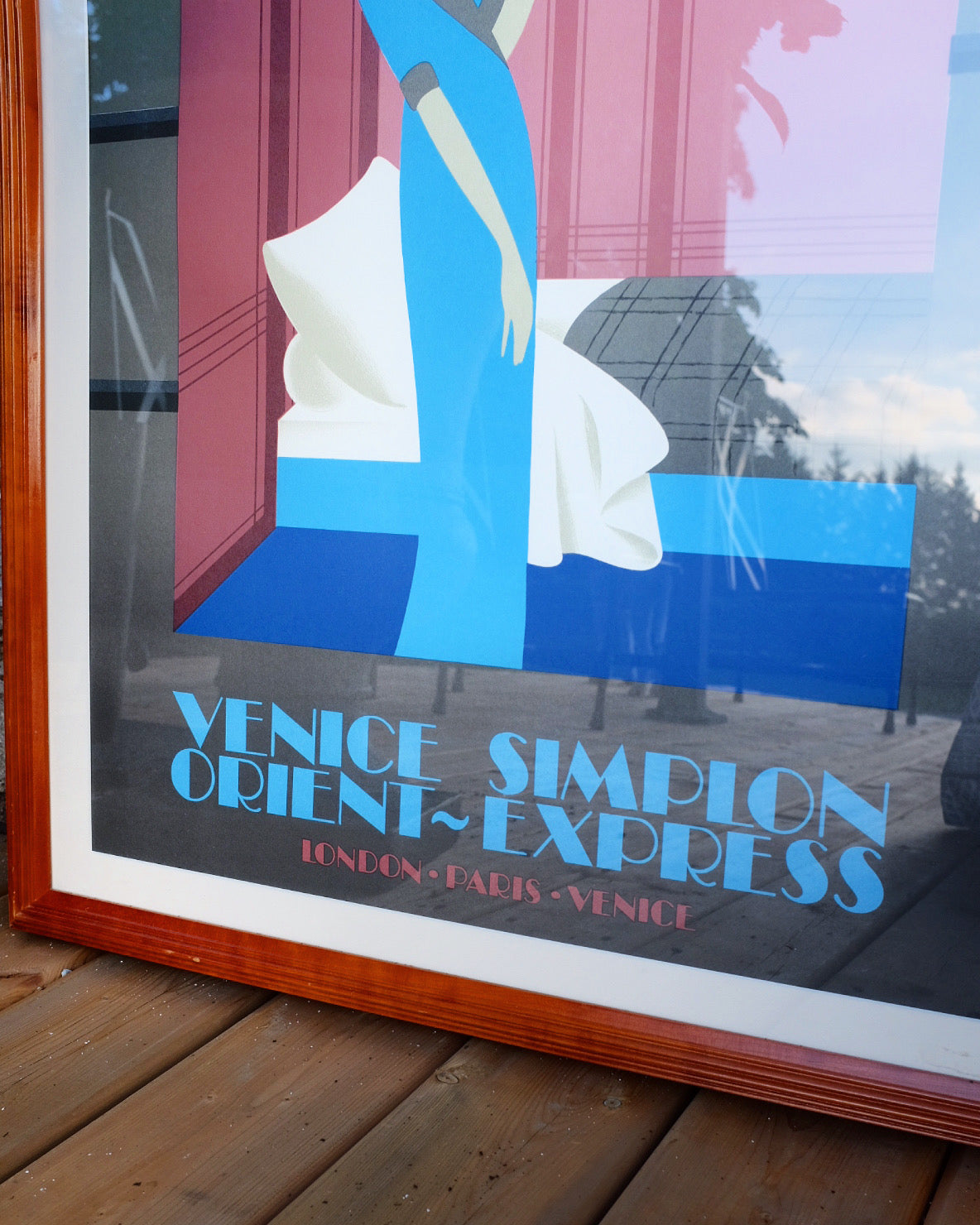 Venice Simplon - Woman in Blue 1981 Framed French Travel Poster by Fix Masseau